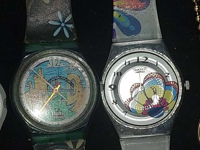 A COLLECTION OF SWATCH WATCHES  SOLD AS IS