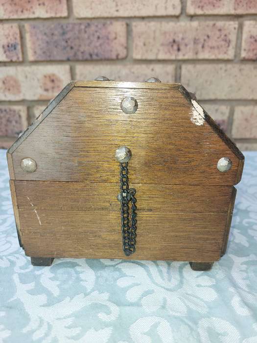 A PIRATES CHEST WOODEN JEWELRY BOX SOLD AS IS