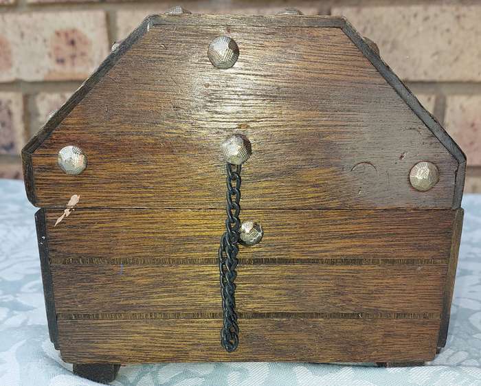 A PIRATES CHEST WOODEN JEWELRY BOX SOLD AS IS