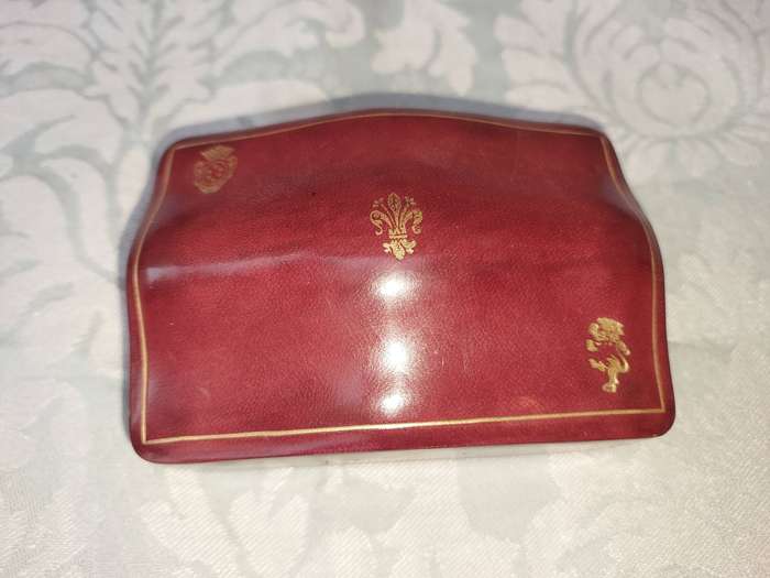 A COLLECTION OF VINTAGE LEATHER-BOUND JEWELRY BOXES SOLD AS IS