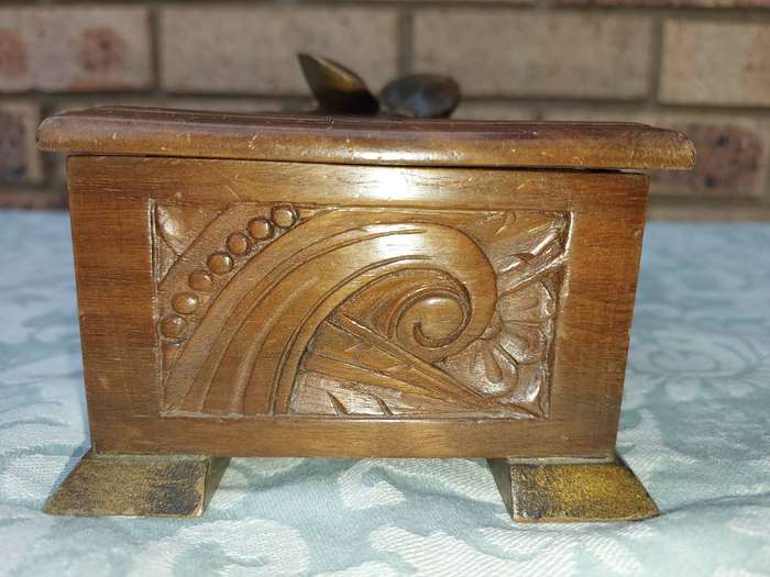 AN ART DECOR WOODEN JEWELRY BOX SOLD AS IS
