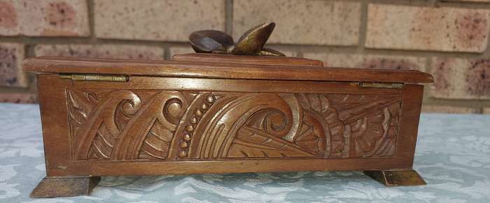 AN ART DECOR WOODEN JEWELRY BOX SOLD AS IS