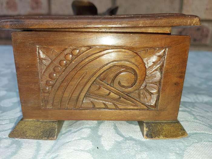 AN ART DECOR WOODEN JEWELRY BOX SOLD AS IS