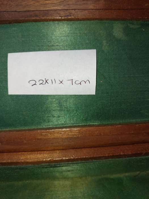 AN ART DECOR WOODEN JEWELRY BOX SOLD AS IS