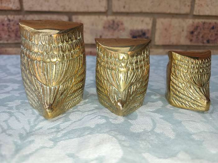 A SET OF 3 ART DECOR BRASS OWLS SOLD AS IS