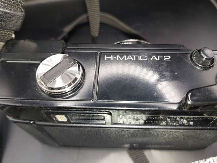 A VINTAGE MINOLTA AUTO FOCUS CAMERA SOLD AS IS NOT TESTED