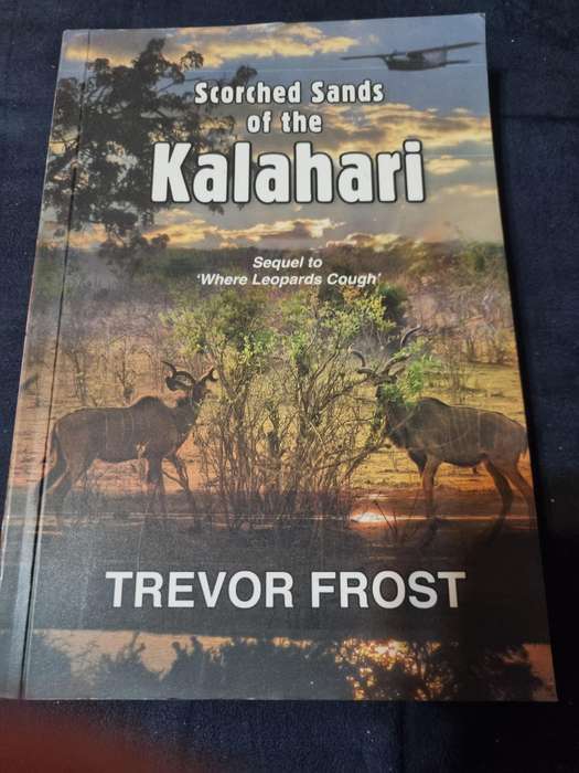Scorched Sands of the Kalahari by and SIGNED by  Trevor Frost