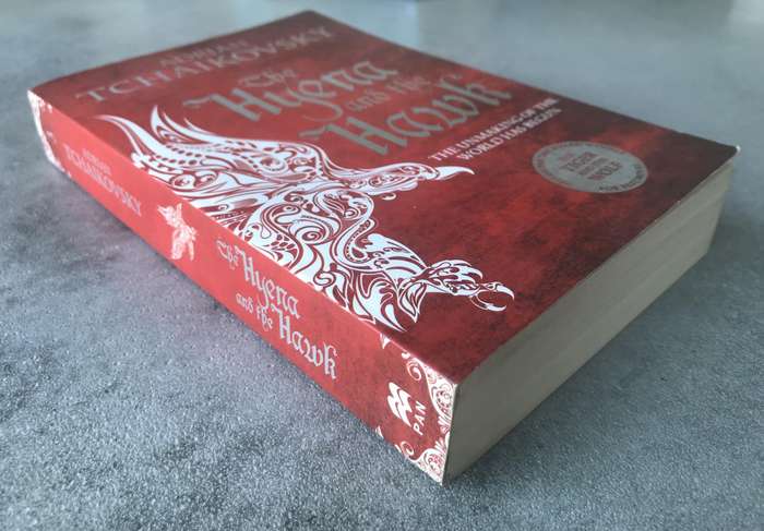 The Hyena and the Hawk (Echoes of the Fall #3) by Adrian Tchaikovsky [Paperback: Excellent]