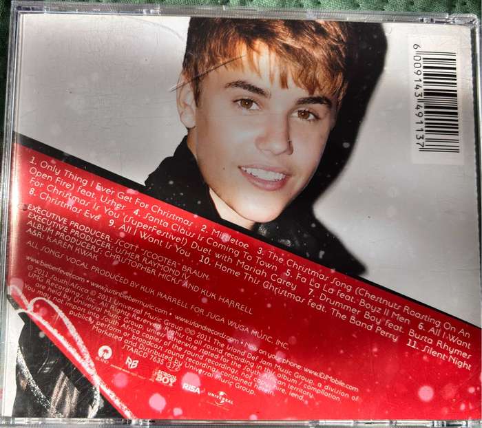 Justin Bieber CDs x 2, Under the Mistletoe & My Worlds