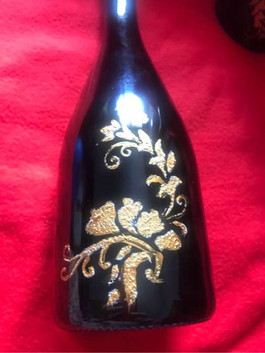 Beautiful green with gold painting on Two Bottles
