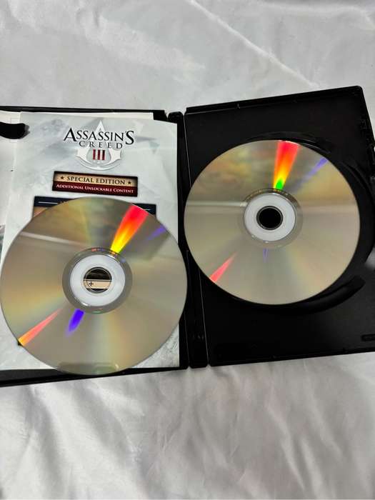 PC DVD ROM Assassins Creed Two Games Revelations, Creed 3 both special editions two disks each