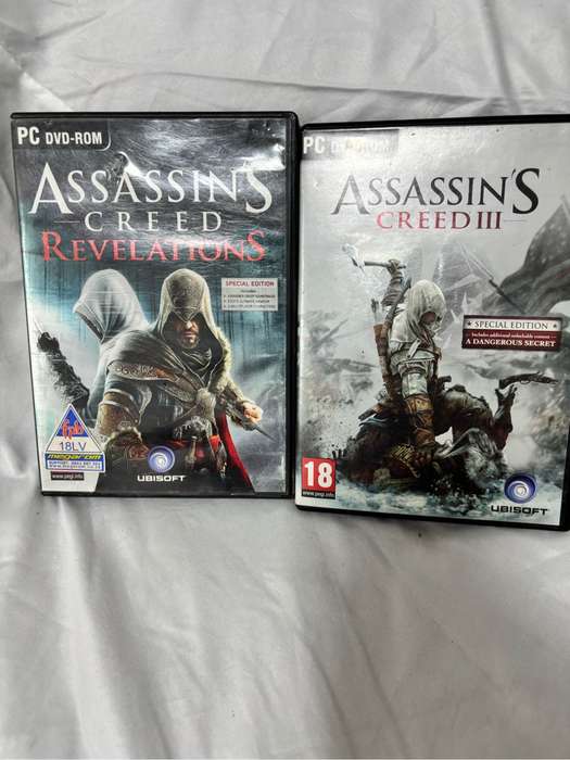 PC DVD ROM Assassins Creed Two Games Revelations, Creed 3 both special editions two disks each