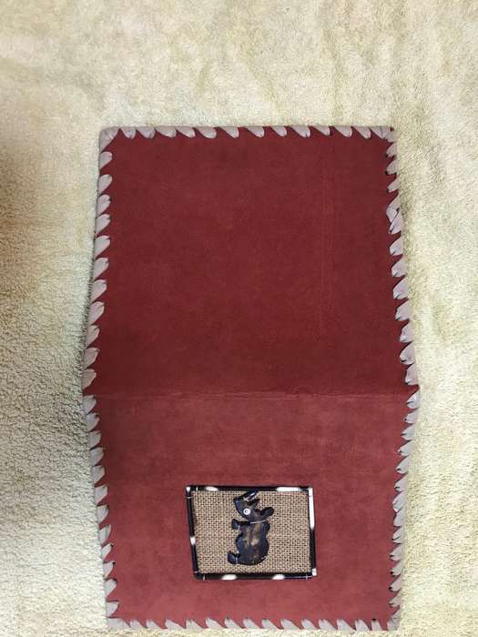 Book cover handmade orange with rhino front cover