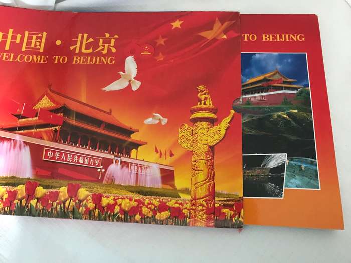 Welcome to Beijing book is in holder pages cardboard