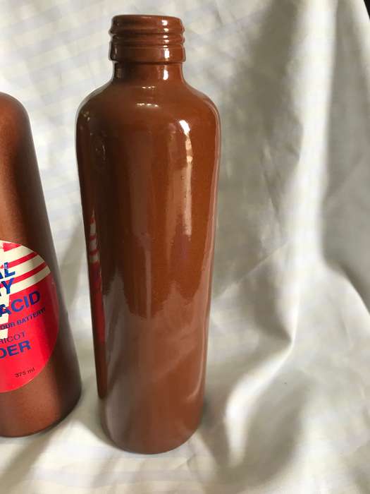 Two stoneware vintage bottles