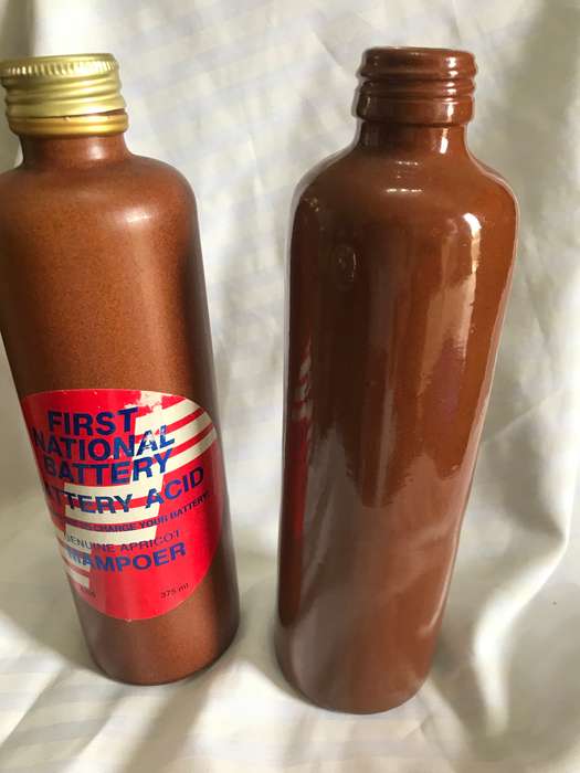 Two stoneware vintage bottles