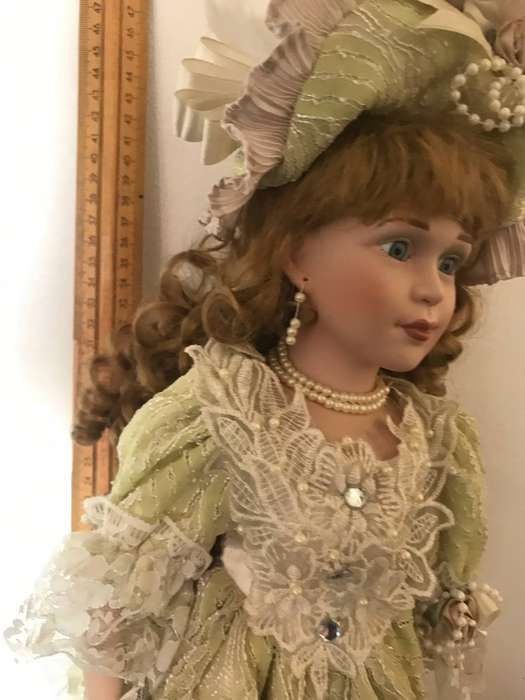 Porcelain Doll on stand 43cm