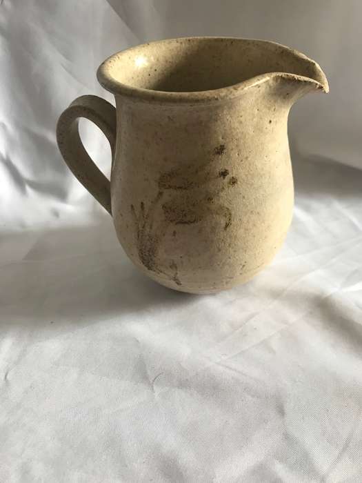 small pottery creamer flower on bothside