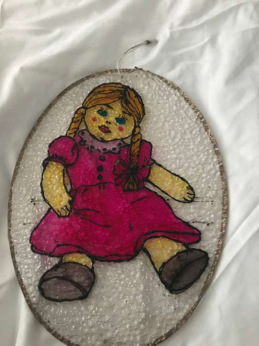 Vintage doll painted on plastic decor