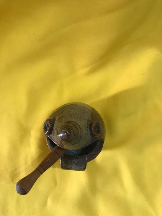 Pottery bowl with wooden spoon