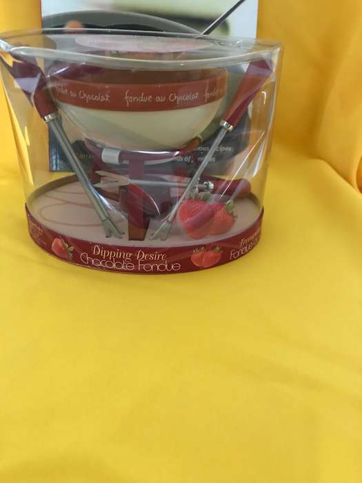 Fondue set New sealed and book