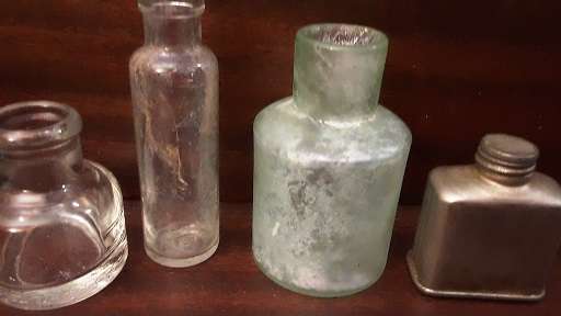 Vintage Four Medisyne small Botlles glass