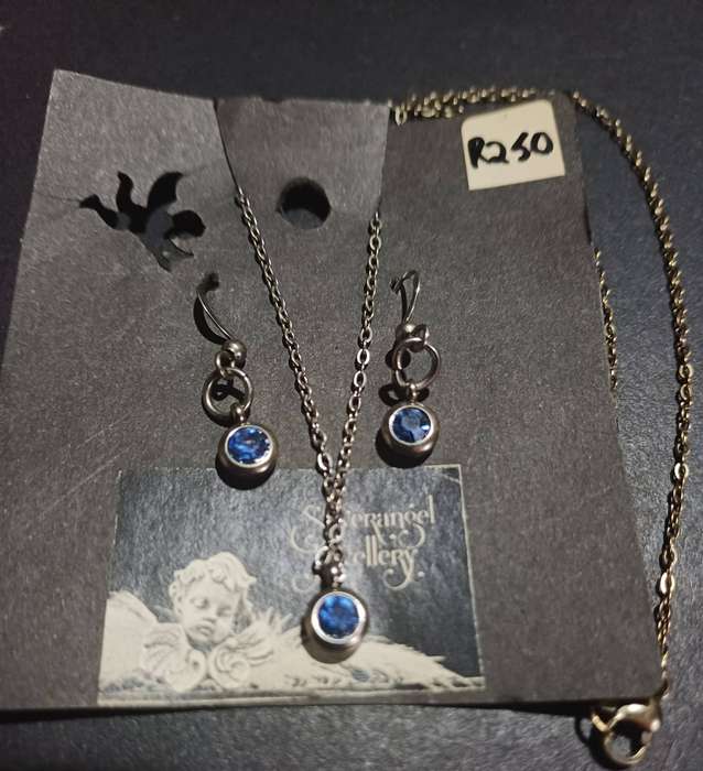 Titanium jewellery set with sapphire blue cz ..earrings and necklace