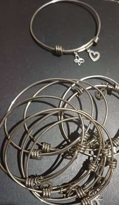 Titanium adjustable bangle with charms