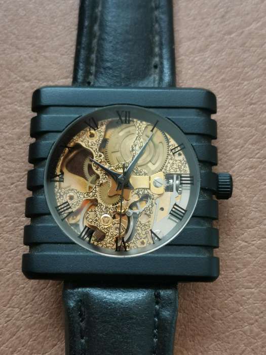 Vintage 1990s new old stock mechanical skeleton watch