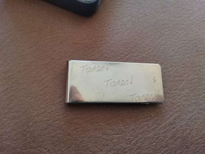 Vintage stainless steel money clip in box as found