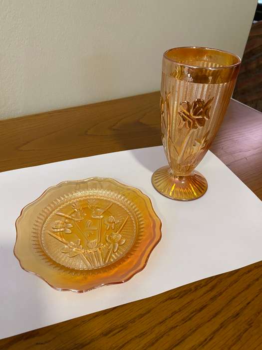 Carnival glass "Iris and herringbone" pedestal tumbler and saucer
