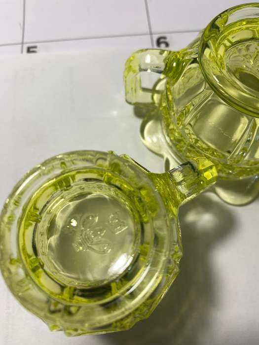 Vaseline glass creamer and sugar bowl with lid