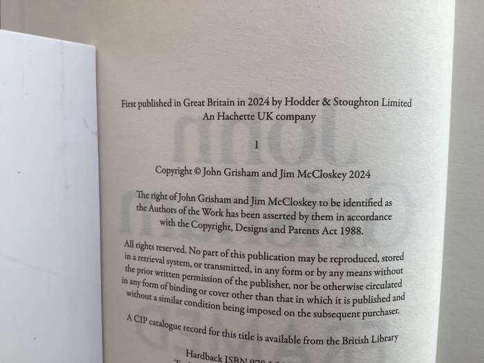FRAMED by John Grisham and Jim McCloskey. Large 1st print paperback, in excellent condition.