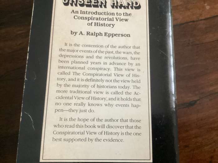 THE UNSEEN HAND. The Conspiratorial View of History. Paperback in a Good + condition.