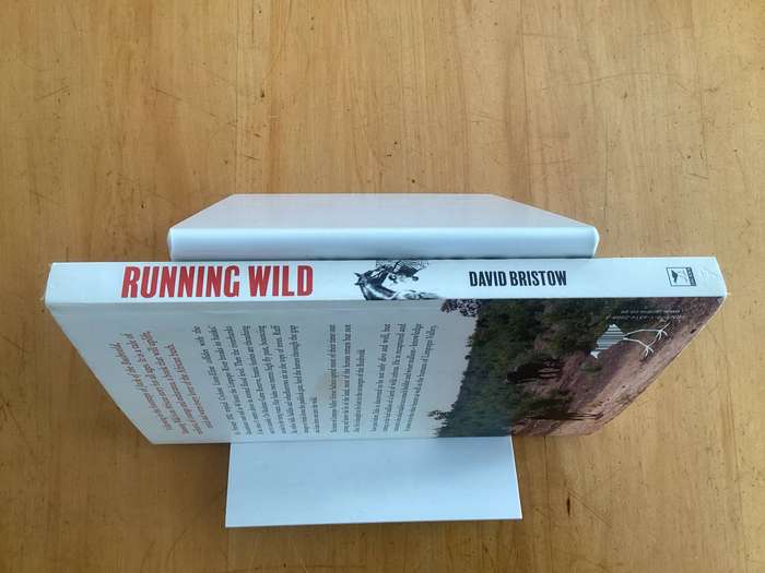 RUNNING WILD by David Bristow. Paperback with stiffened-board covers, in excellent condition.
