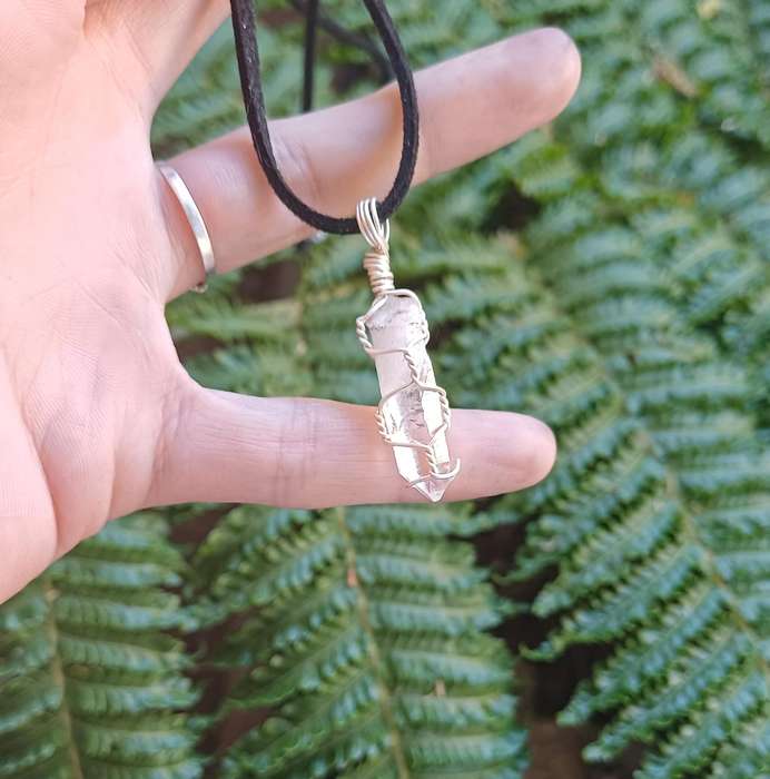 Clear Quartz in Silver Coloured Copper Wire Pendant Twisted & Stoned