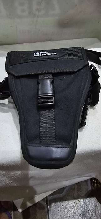 NIKON F601 CAMERA WITH LENS ,CASE AND A SPARE FILM ROLL