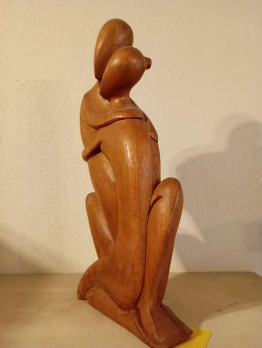 Carved Wooden Couple Embracing Statue