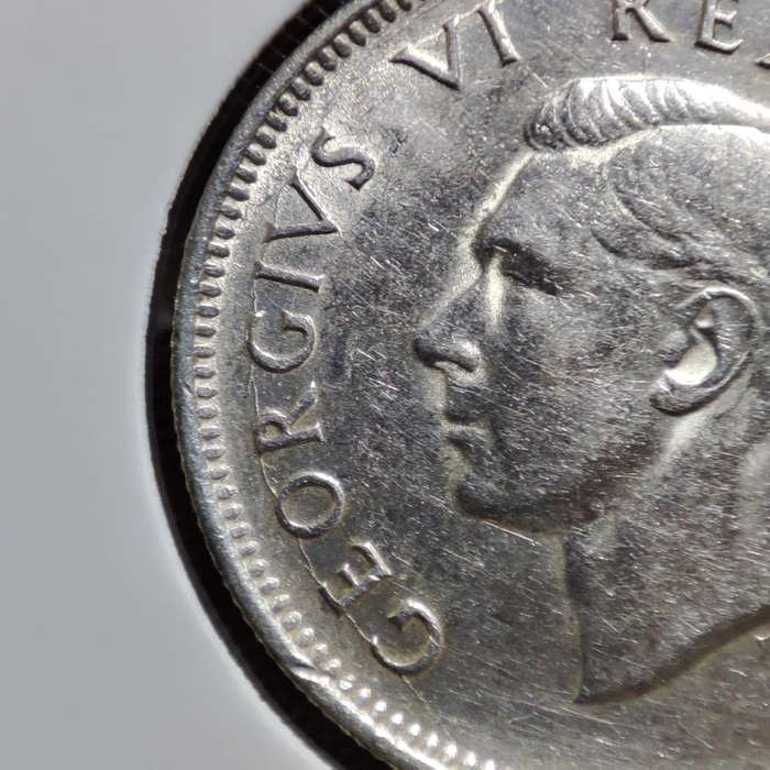 1943 SHILLING 80% SILVER COIN - CRACKED DIE ERROR
