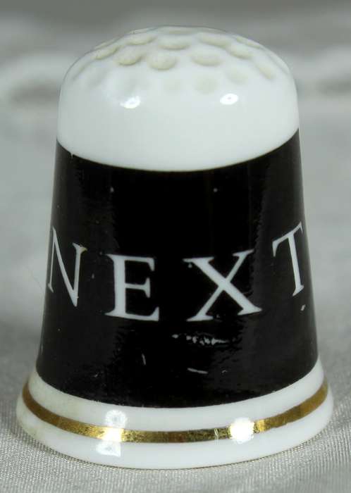 Bone China thimble - advertising - NEXT