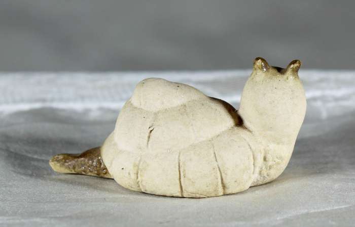 Miniature ceramic snail