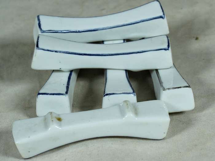 Set of blue & white porcelain knife rests
