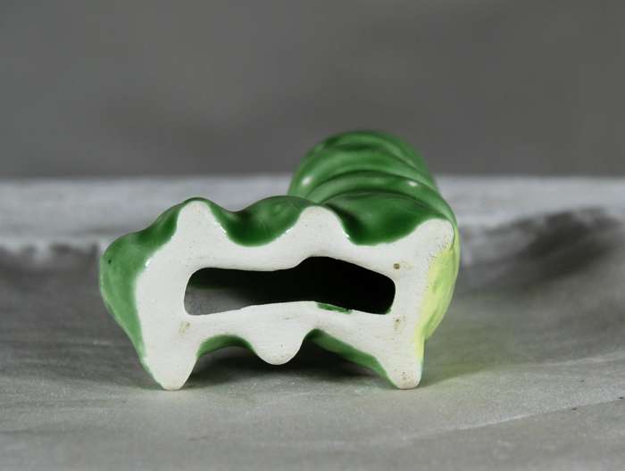 Miniature porcelain green worm