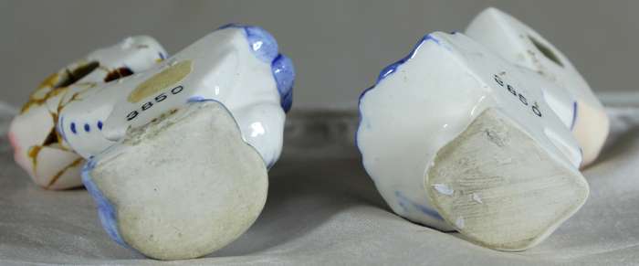 Porcelain kids kissing