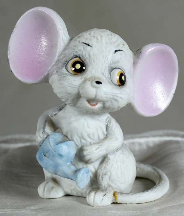 Mouse with a watering can