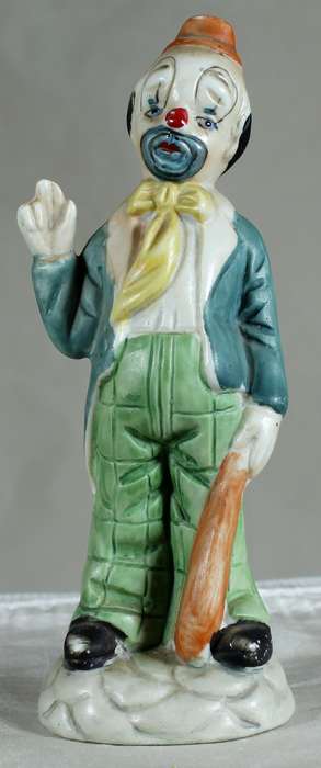 Sad clown waving