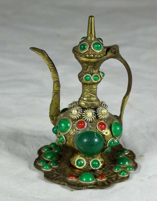 Small brass Arabic / Moroccan teapot on a tray