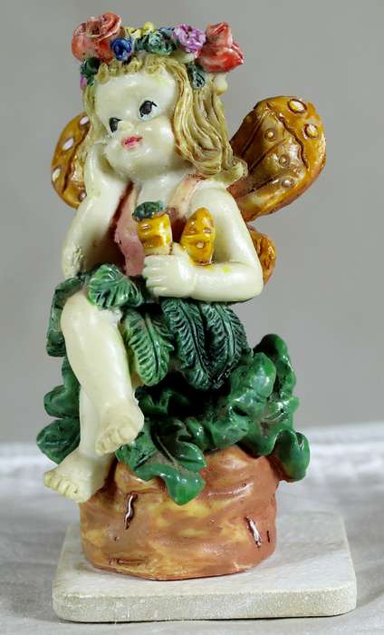 Seated fairy in thought