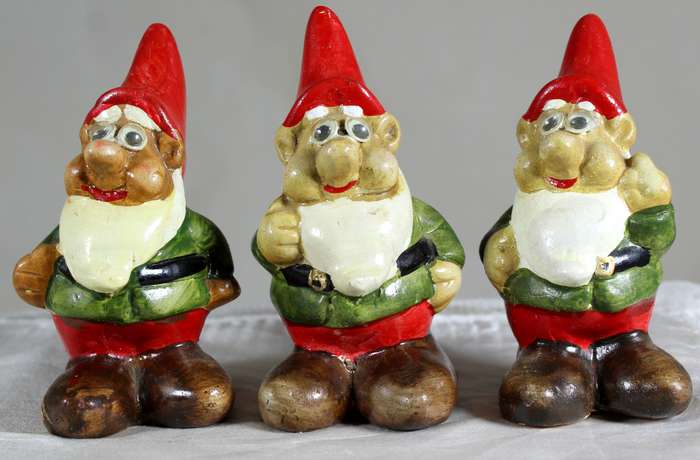 Trio of small garden gnomes