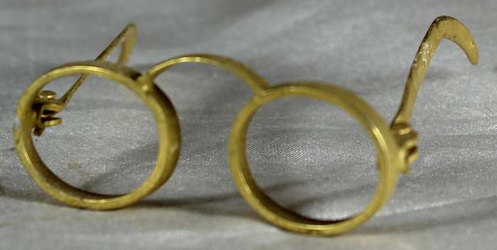 Miniature brass glasses